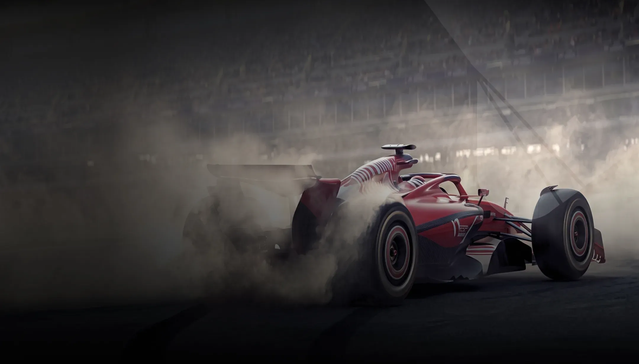 A single-seater race car sliding through a cloud of dust on track